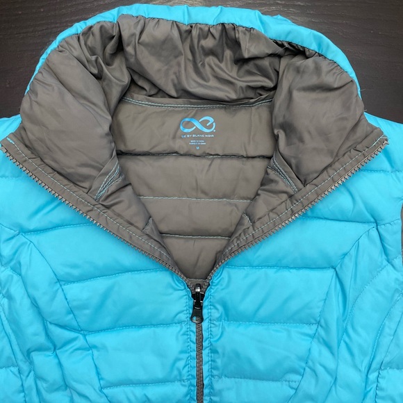 Reversible down vest - Picture 2 of 4